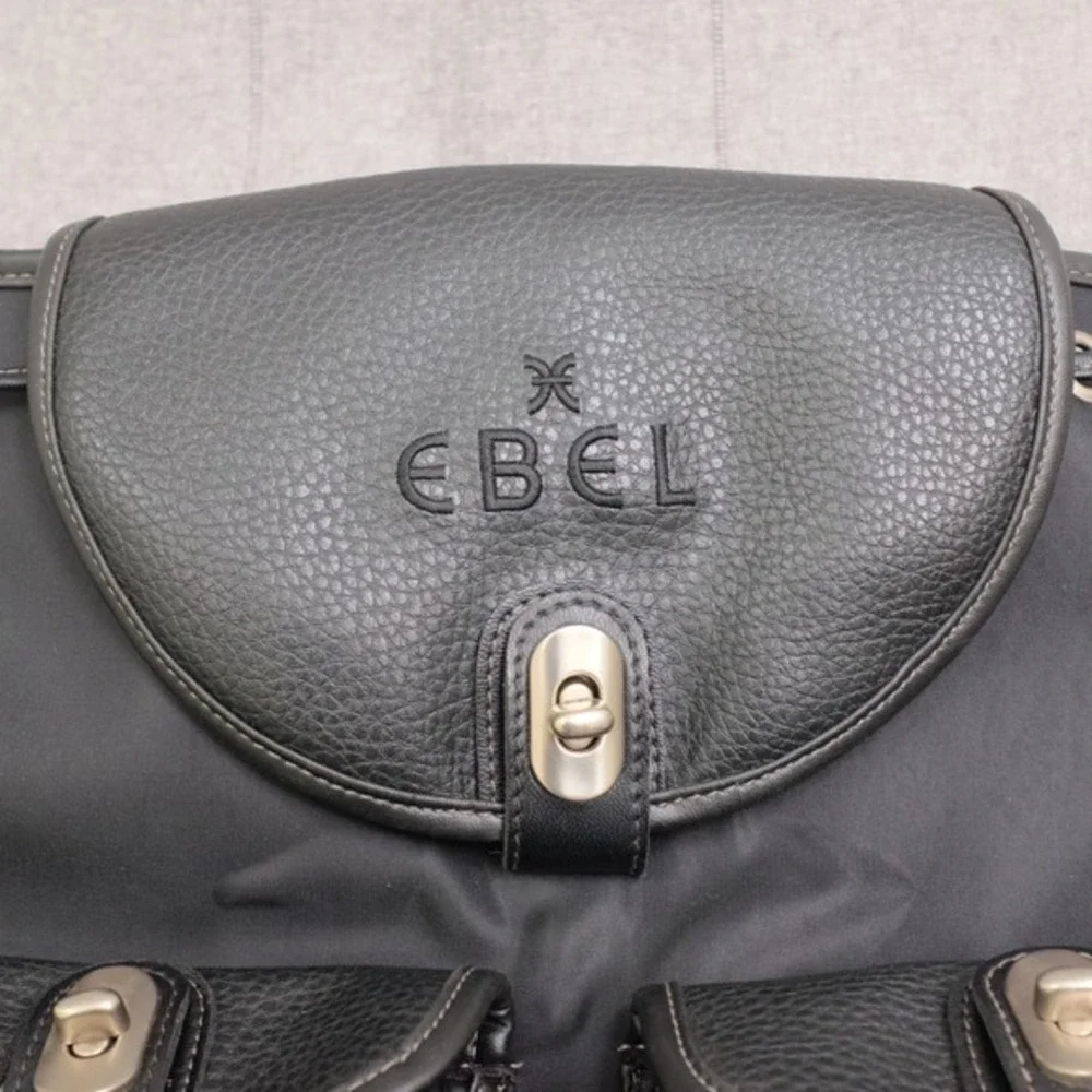Ebel Black Nylon Faux Leather Turn Lock Cinch‎ Top Travel Backpack